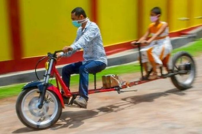 Motor listrik model social distancing bikinan pria putus sekolah di India