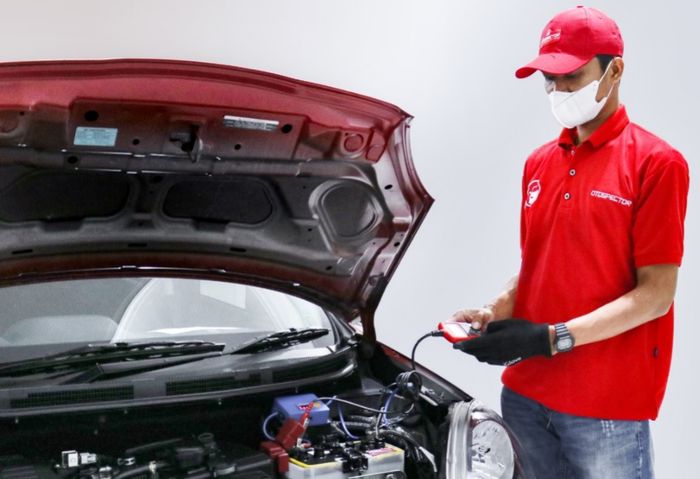 Ilustrasi. Inspeksi mobil bekas Otospector