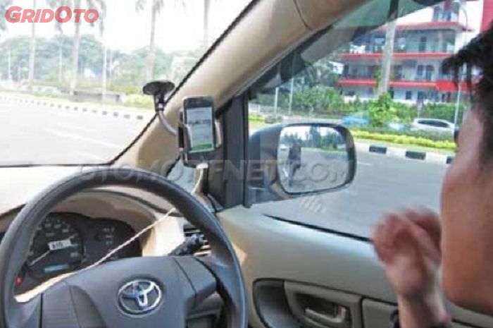 Ilustrasi driver taksi online