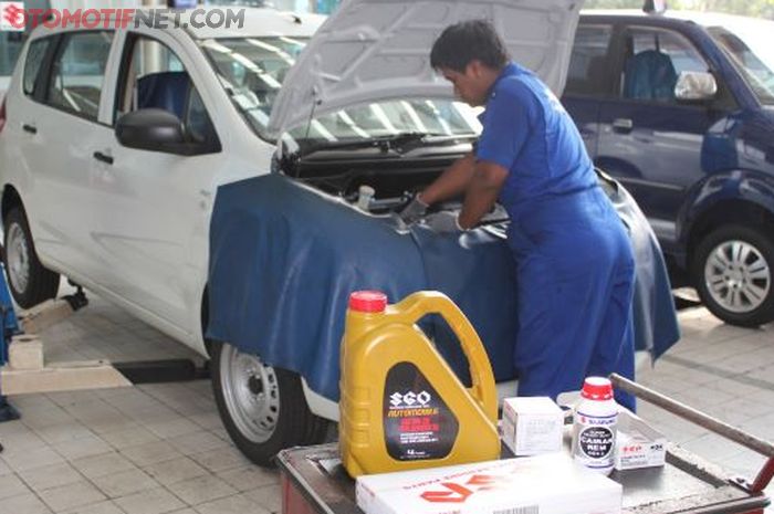 Ilustrasi servis rutin di bengkel resmi Suzuki.