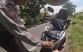 Viral Video Oknum Polisi Sabhara Tilang Turis Jepang di Bali, Bolehkah?